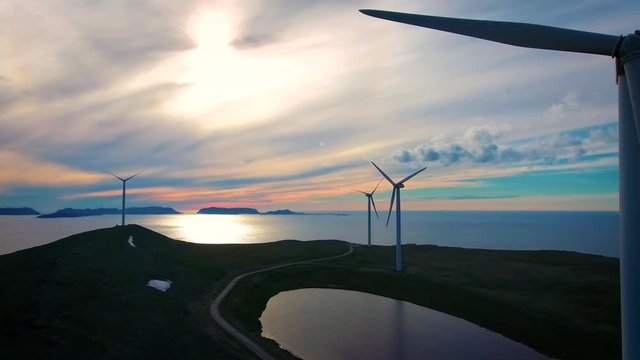 Windmills for electric power production. Arctic View Havoygavelen windmill park, Havoysund, Northern Norway Aerial footage.