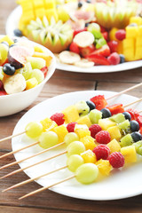 Fresh fruit salad on a brown wooden table