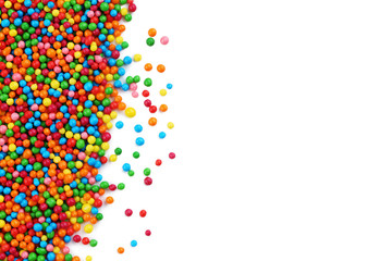 Fototapeta premium Colorful sprinkles on a white background