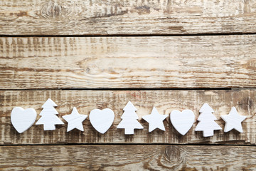 Decorative fir-tree, star and heart on a grey wooden table