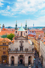 Naklejka na ściany i meble Panorama of the old part of Prague from the Old Town Bridge Tower. Old colorful Town architecture, Czech Republic.