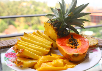 tropical fruit pineapple, mango, corambola, papaya