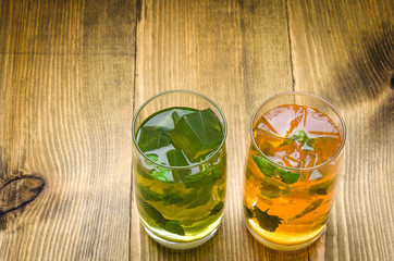 on a wooden surface hammer/on a light surface hammer