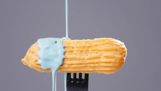 eclair pour glaze gray background