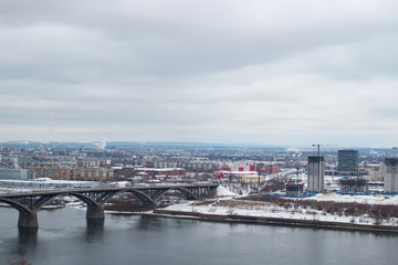 Fototapeta na wymiar City bridge river winter building. Nizhny Novgorod, Russia