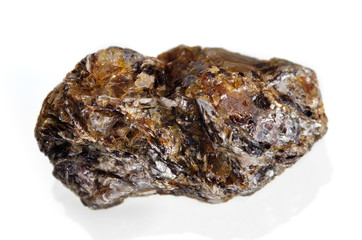 Muscovite and biotite minerals envolving quartz crystal