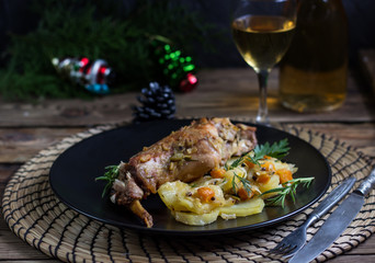 Baked rabbit with vegetables.