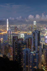 Fototapeta na wymiar Hong Kong's famous skyline viewed from the Victoria Peak in the evening.