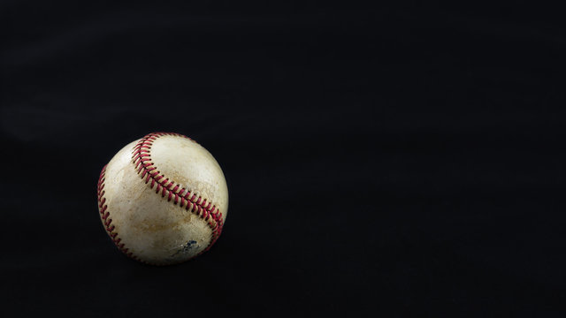 Baseball on a black background. 