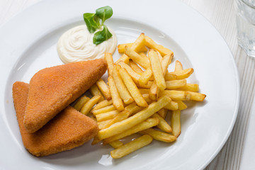 Fried cheese with french fries and tartar sauce