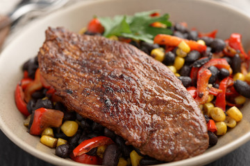 Roasted turkey with black bean salad