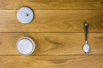 Sodium bicarbonate on wooden background