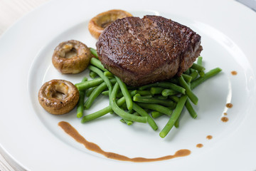 Delicious sirloin steak with green beans