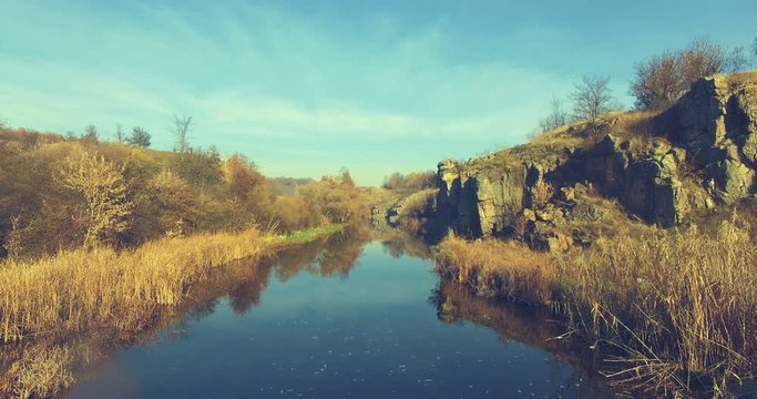 Aerial Drone Flight Footage: Picturesque view on Buky Canyon, Cherkasy region, Ukraine. Beautiful landscape in sunset light. Beauty world. 4K resolution.