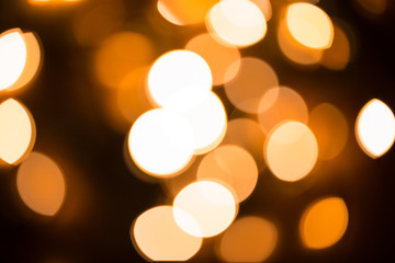 Defocused gold abstract Christmas Glitter Lights bokeh Background