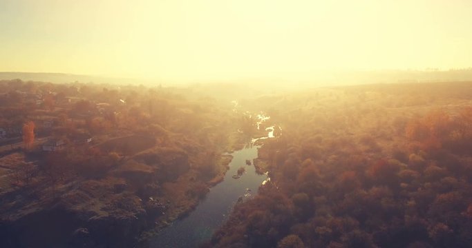 Aerial Drone Flight Footage: Picturesque view on Buky Canyon, Cherkasy region, Ukraine. Beautiful landscape in sunset glow. Camera turn right. Beauty world. 4K resolution.
