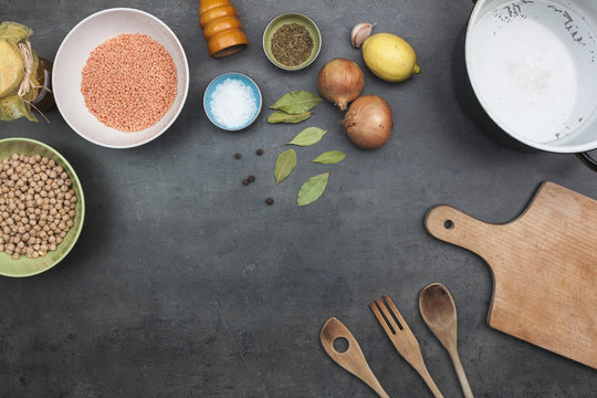 Top view on food ingredients and cooking accessories. Flat lay food background.