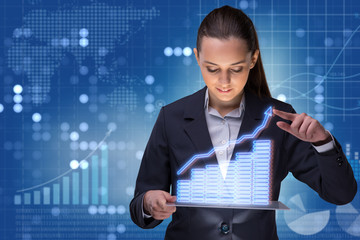 Businesswoman in stock trading business concept