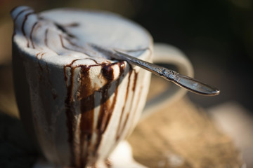 Fototapeta premium Overflowing Hot Chocolate with Spoon