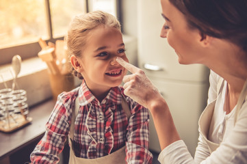 Mom and daughter baking
