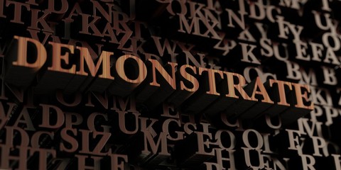 Demonstrate - Wooden 3D rendered letters/message.  Can be used for an online banner ad or a print postcard.