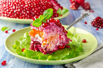 Salad Garnet bracelet on a wooden table