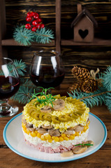 Layered salad with ham, mushrooms and corn