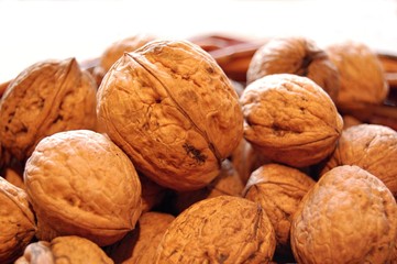 detail of wicker basket full of home grown walnuts