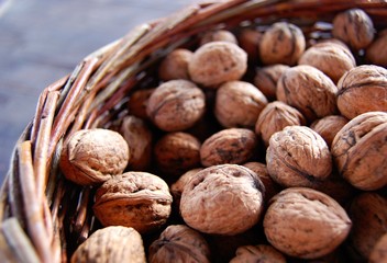 detail of wicker basket full of home grown walnuts