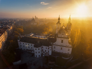 Fototapeta Aerial view of misty dawn over the church in Krakow. obraz