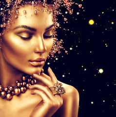 Beauty fashion model girl with golden makeup, hair style isolated on black background