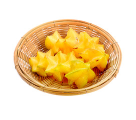 Star fruit in basket isolated on white background