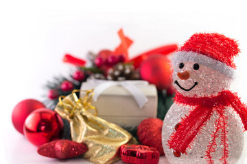 Snowman with christmas decorations and gift box.