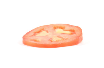 Fresh slice of organic heirloom tomato