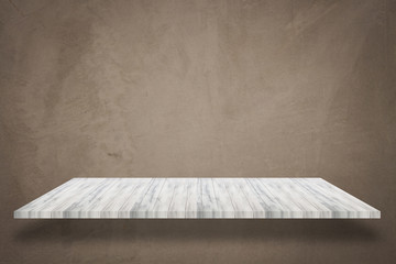 Empty white top wooden shelf with concrete wall background