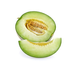 Green cantaloupe melon slices on white