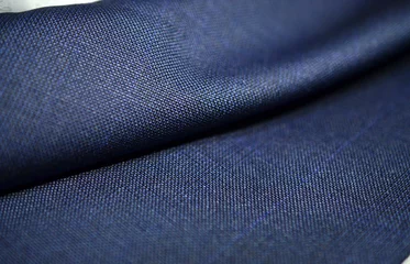 Photo sur Plexiglas Poussière Close up roll texture tissu bleu de costume