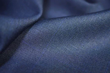 Foto op Plexiglas Stof close-up textuur blauwe stof van pak
