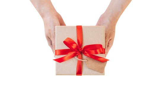 Hand woman holding gift box on isolated with clipping path. Imag