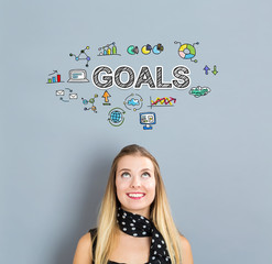 Goals concept with happy young woman