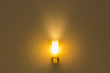 Lighted classic sconce on the wall