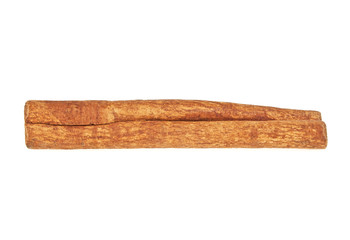 Single cinnamon stick isolated on white background
