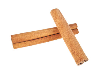 Two cinnamon sticks isolated on white background