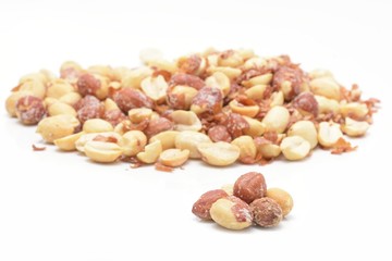 Salted roasted peanuts on white