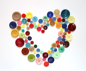 Heart of buttons isolated on a white background. Sewing with love 2