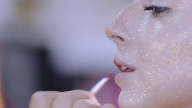 make-up artist doing make-up fashion