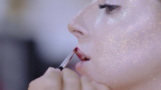 make-up artist doing make-up fashion