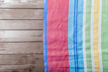 Tablecloth textile on wooden background