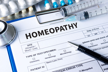 HOMEOPATHY  - A homeopathy concept with homeopathic medicine  Ho