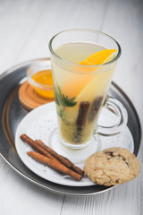 hot tea in glass on wood table
